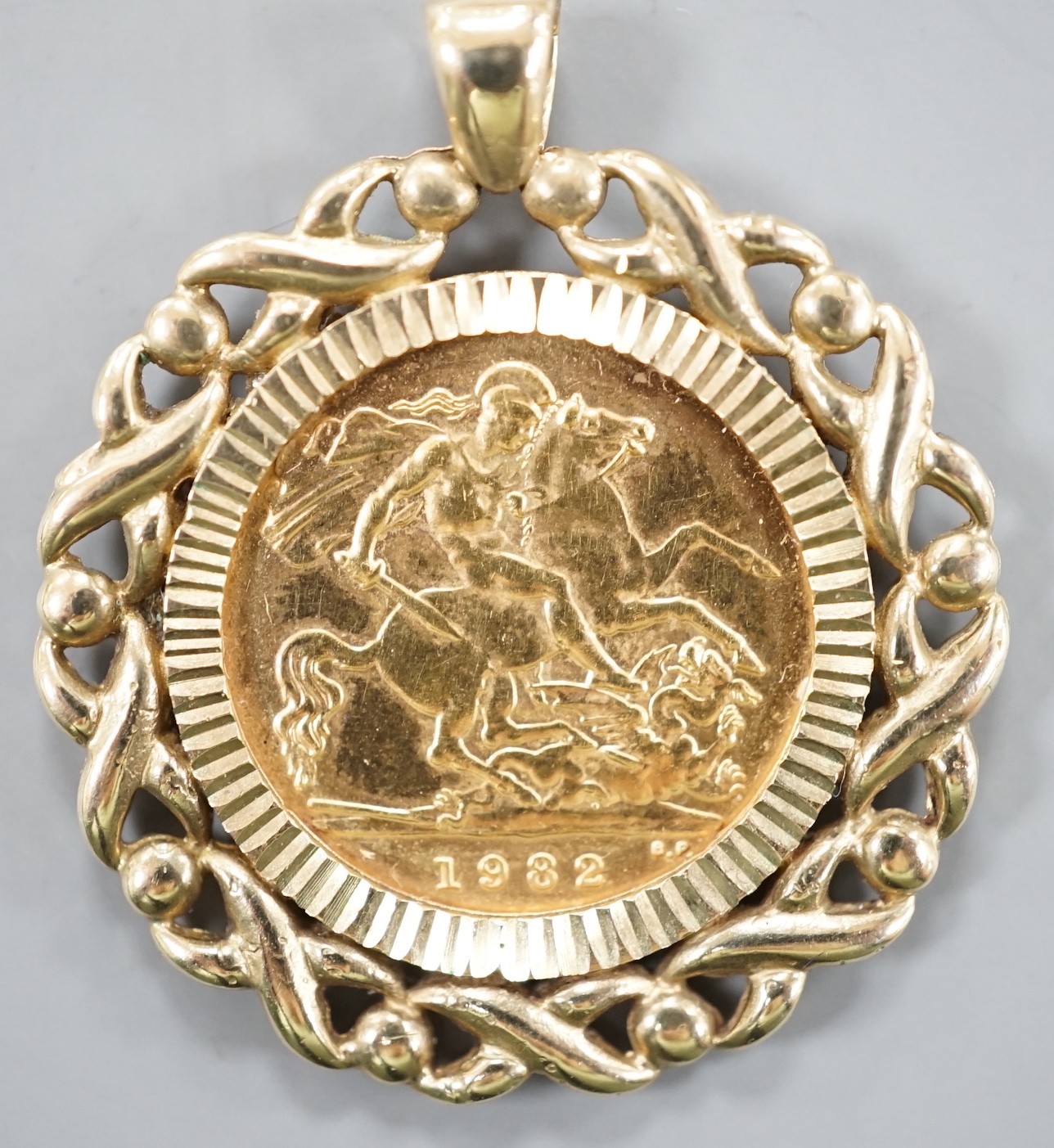A Queen Elizabeth II 1982 gold half sovereign, now in a 9ct gold pendant mount, gross 7.9 grams.